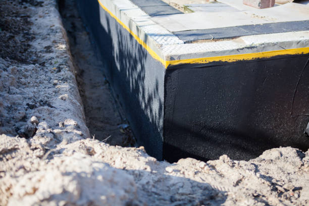 Professional Exterior Waterproofing technician working in Woodcliff Lake, NJ